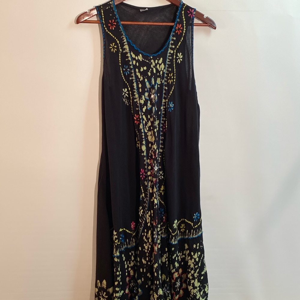 Dress or swimsuit cover.  100% Rayon Free size.